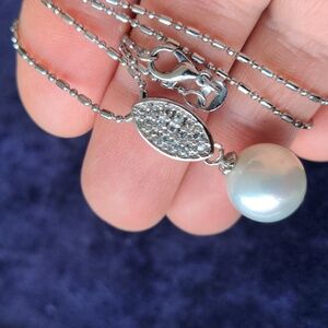One of a kind exotic 925 silver necklace with large faux pearl pendant
